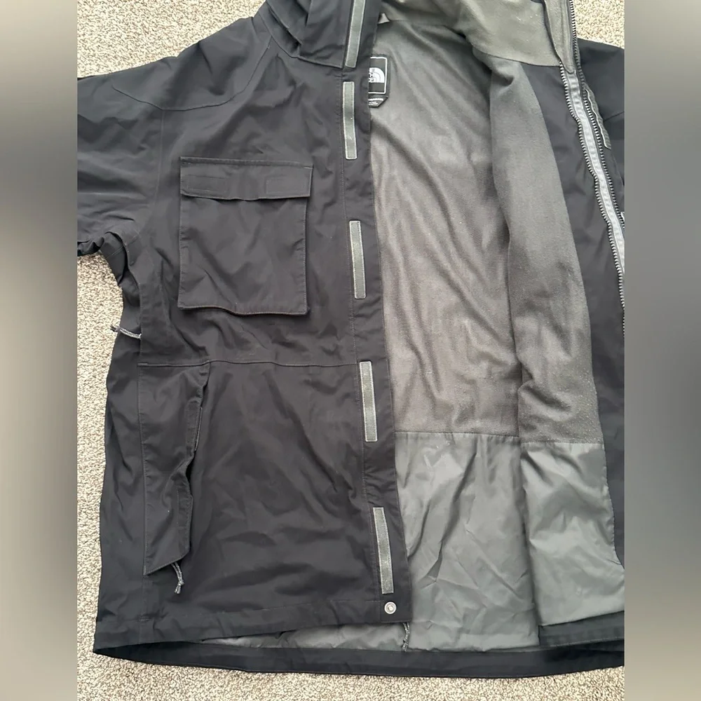 The North Face Black Hooded Raincoat with Multiple Front Pockets